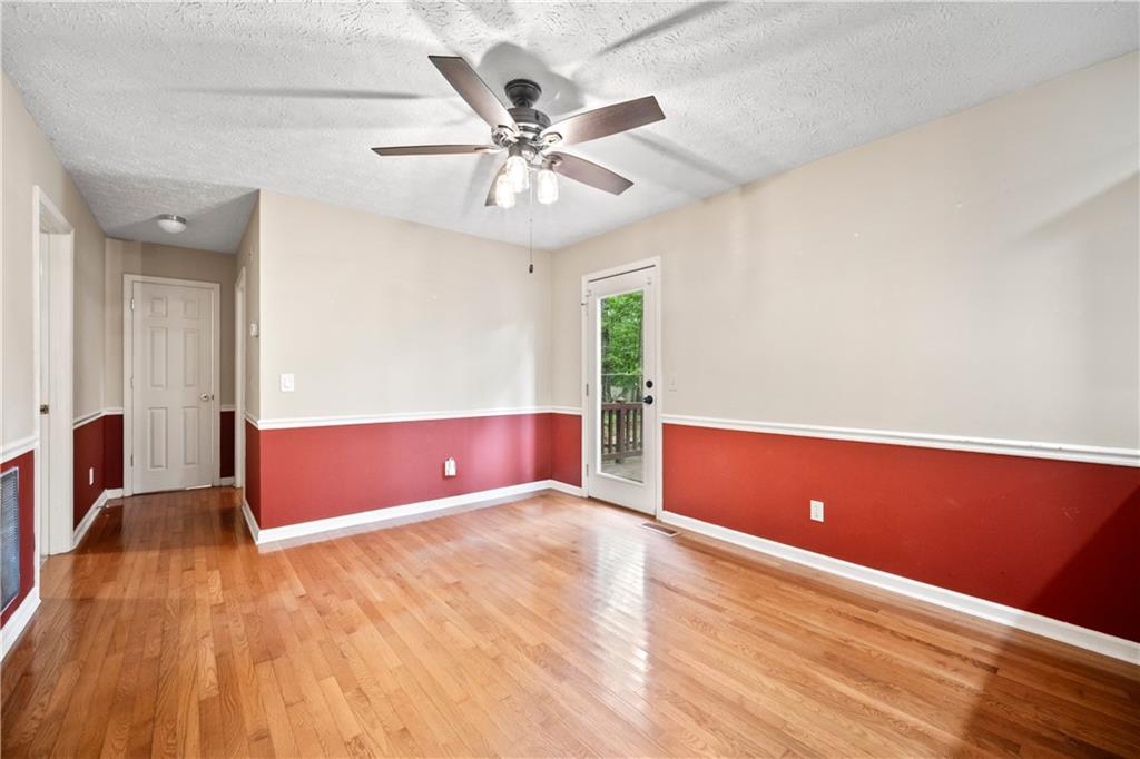 2009 Ben Higgins Road Dahlonega, GA 30533 - Photo 9 of 25 a view of room with window and wooden floor