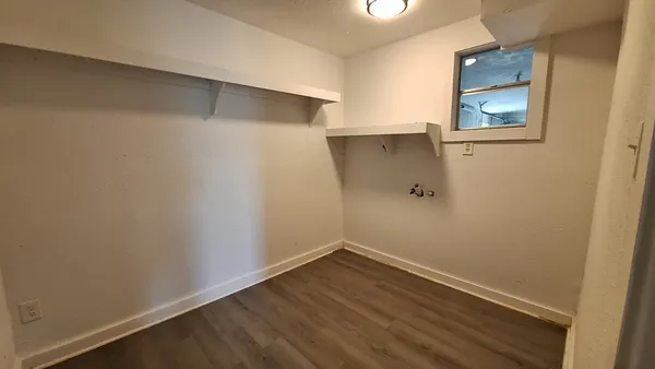 an empty room that has a window