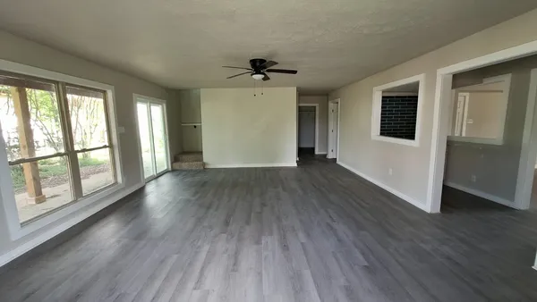 wooden floor with staircase