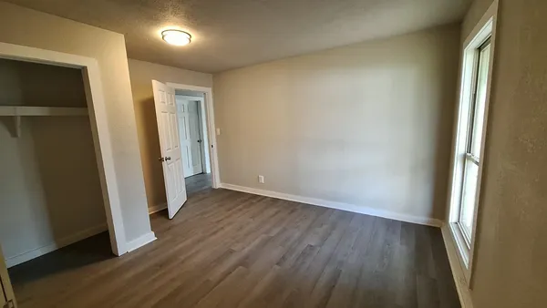 a view of empty room with windows