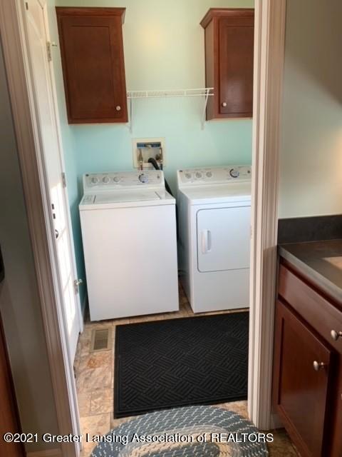 4050 Matthews Road Charlotte, MI 48813 - Photo 11 of 35 Laundry Area (With Doors on either side
