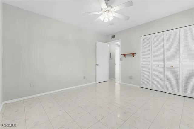 a bathroom with a sink toilet vanity and shower