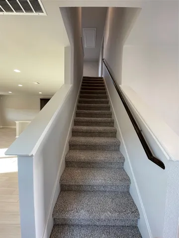 a view of a living room and dining room