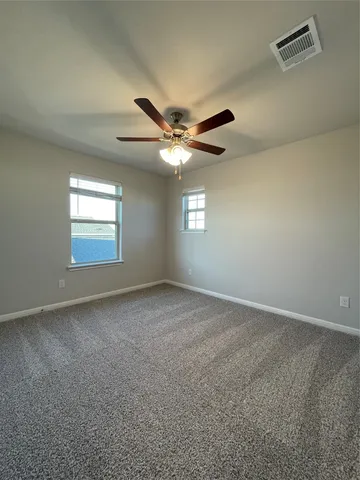 a view of a room with a wardrobe space