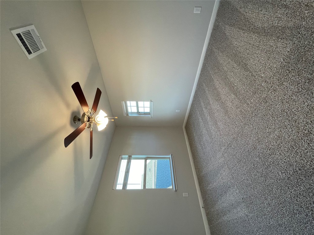 125 Old Stagecoach Road Jarrell, TX 76537 - Photo 18 of 31 a view of an empty room with a window