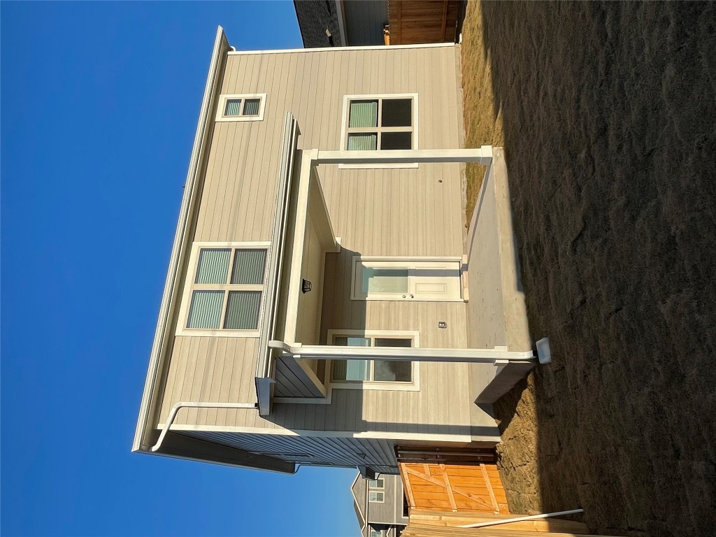 125 Old Stagecoach Road Jarrell, TX 76537 - Photo 29 of 31 a front view of a house with a yard