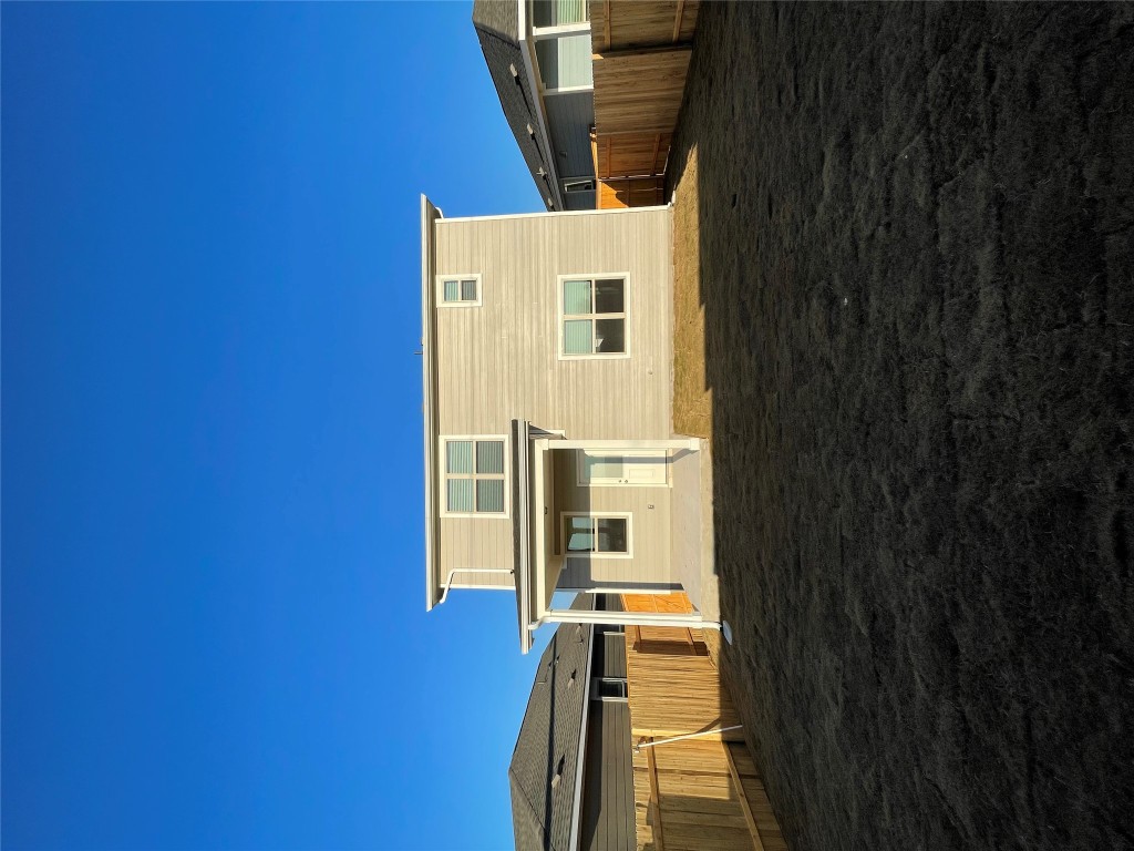 125 Old Stagecoach Road Jarrell, TX 76537 - Photo 30 of 31 a view of house with backyard