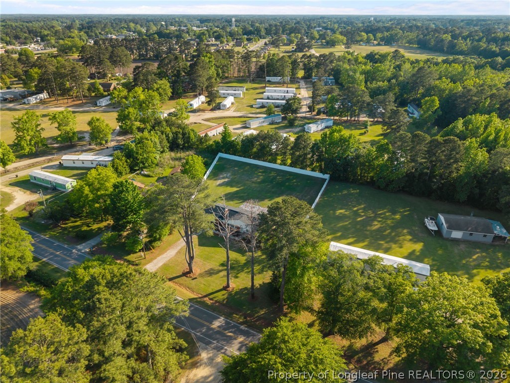 309 Cornith Road Pembroke, NC 28372 - Photo 12 of 49 an aerial view of residential houses with outdoor space and swimming pool