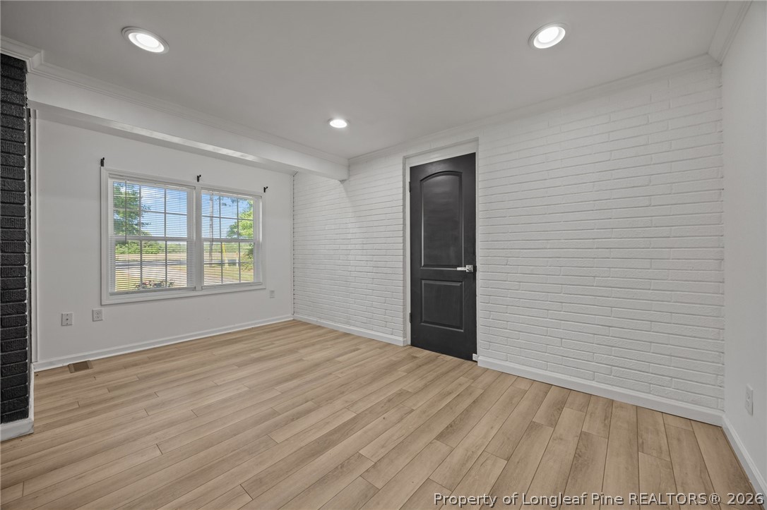 309 Cornith Road Pembroke, NC 28372 - Photo 24 of 49 a view of empty room with wooden floor and fan