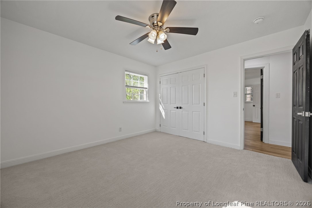 309 Cornith Road Pembroke, NC 28372 - Photo 34 of 49 an empty room with a window and a ceiling fan