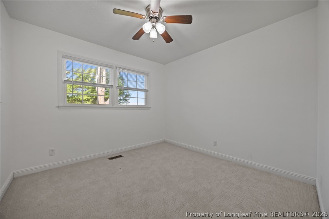 309 Cornith Road Pembroke, NC 28372 - Photo 36 of 49 an empty room with windows and fan