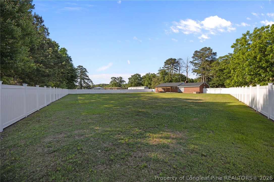 309 Cornith Road Pembroke, NC 28372 - Photo 44 of 49 a view of a golf course with a garden