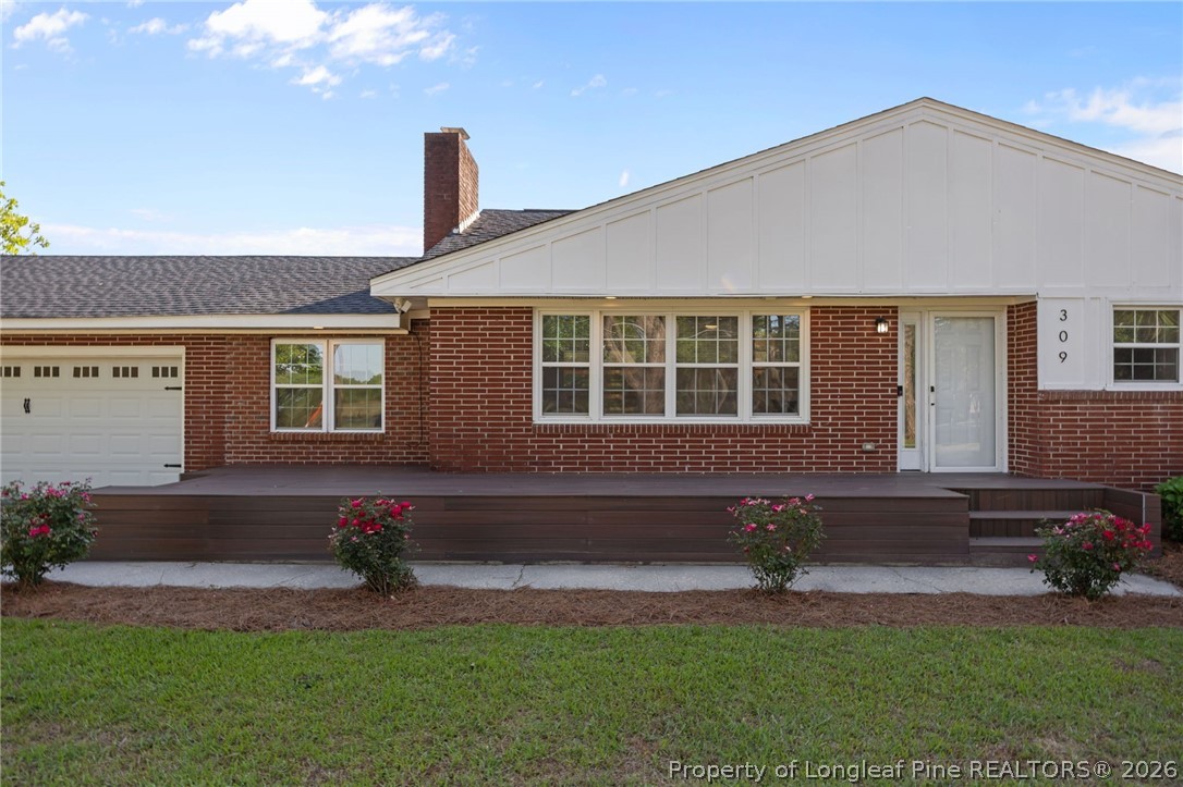 309 Cornith Road Pembroke, NC 28372 - Photo 48 of 49 a front view of a house with garden