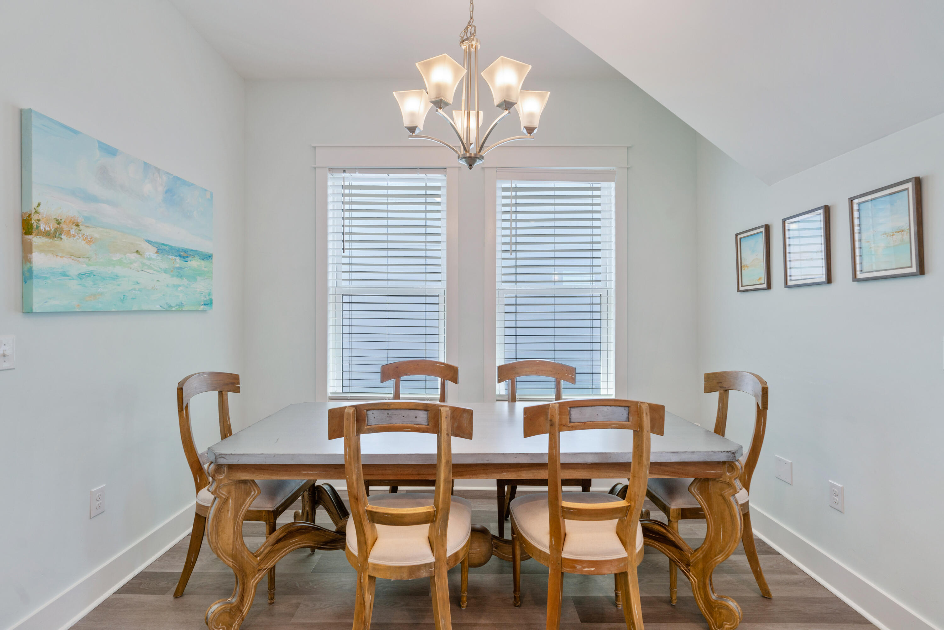 30 Constant Avenue Santa Rosa Beach, FL 32459 - Photo 12 of 51 a view of a dining room with furniture and chandelier