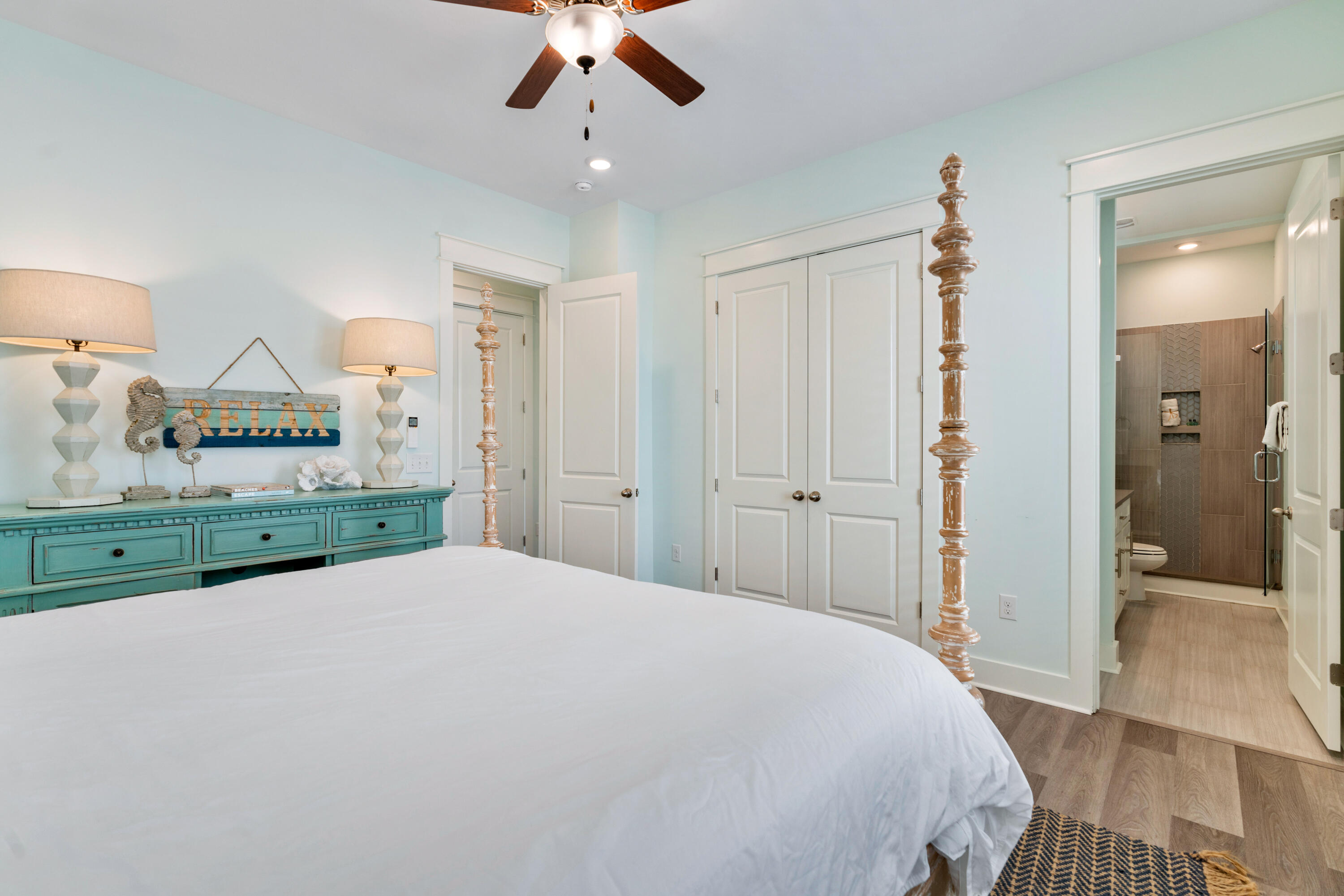 30 Constant Avenue Santa Rosa Beach, FL 32459 - Photo 17 of 51 a spacious bedroom with a bed and a walk in closet