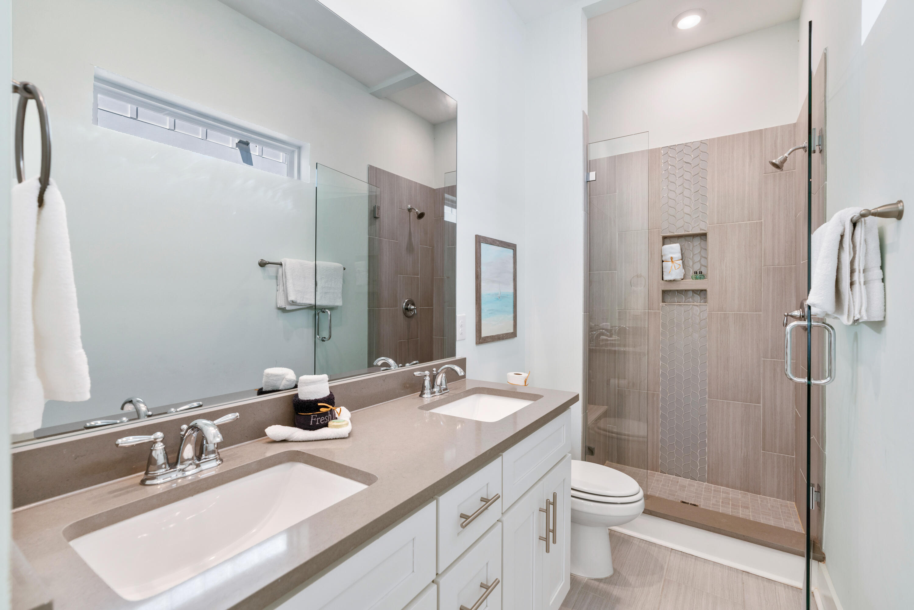 30 Constant Avenue Santa Rosa Beach, FL 32459 - Photo 18 of 51 a bathroom with a double vanity sink toilet mirror and shower