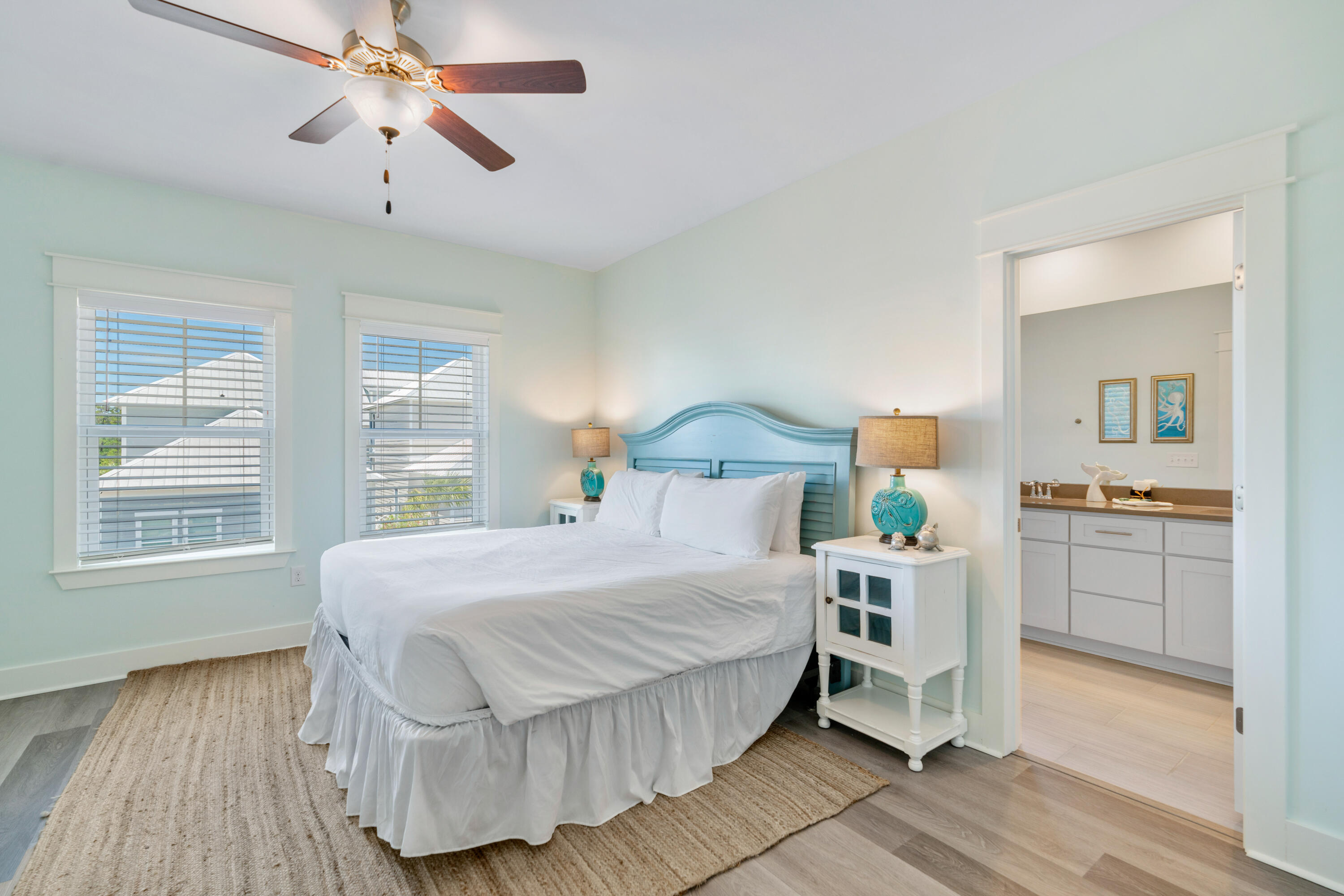 30 Constant Avenue Santa Rosa Beach, FL 32459 - Photo 19 of 51 a bedroom with a bed and wooden floor