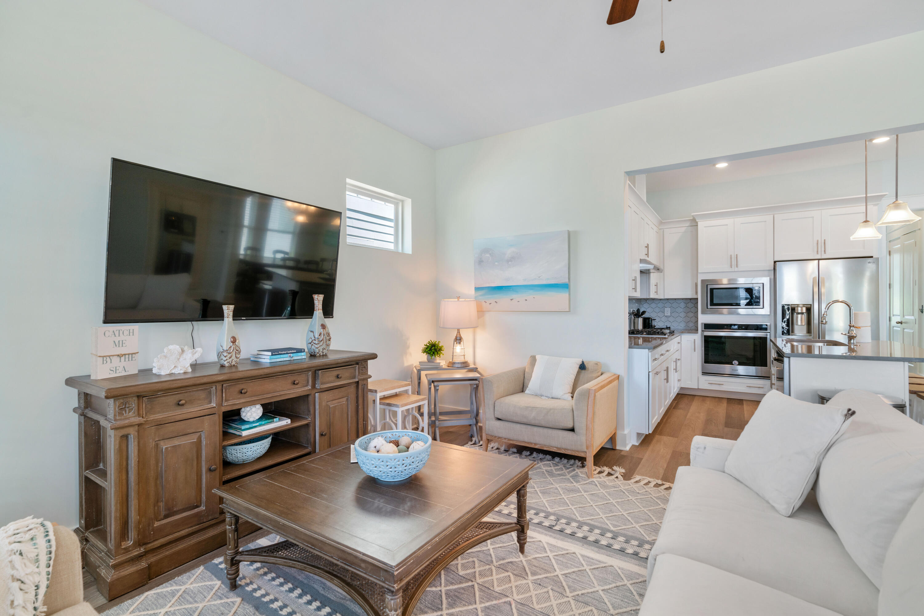 30 Constant Avenue Santa Rosa Beach, FL 32459 - Photo 2 of 51 a living room with furniture and a flat screen tv