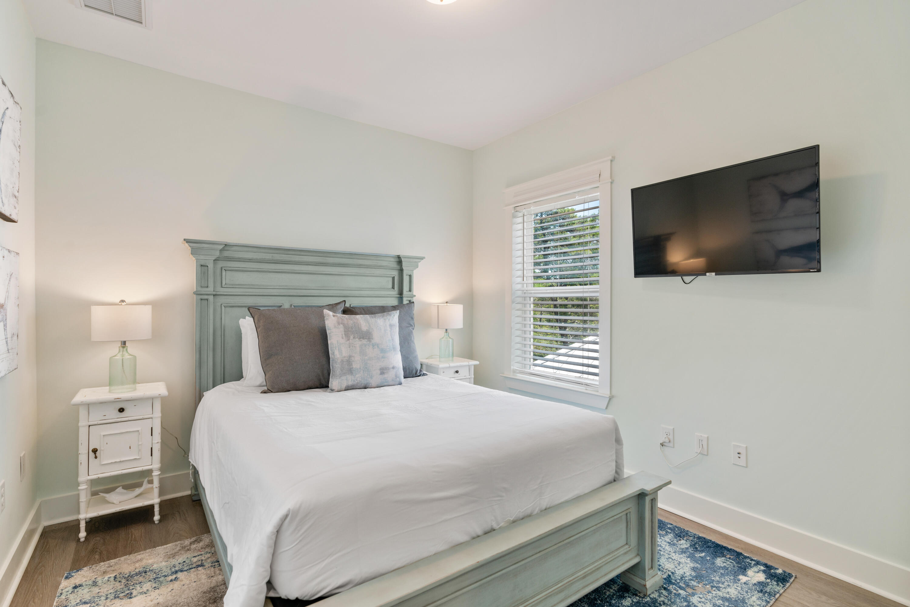 30 Constant Avenue Santa Rosa Beach, FL 32459 - Photo 24 of 51 a bedroom with a bed and a flat screen tv