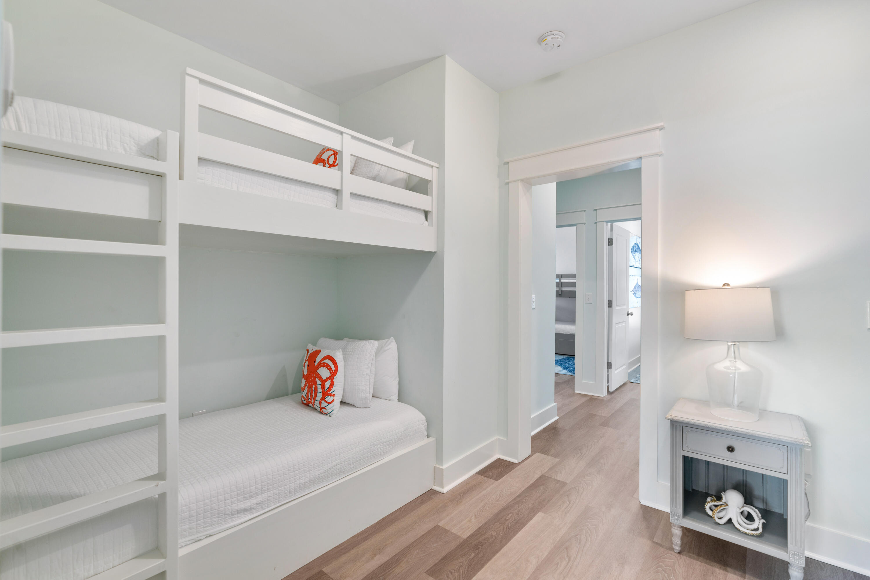 30 Constant Avenue Santa Rosa Beach, FL 32459 - Photo 29 of 51 a walk in closet with view of bedroom and wooden floor