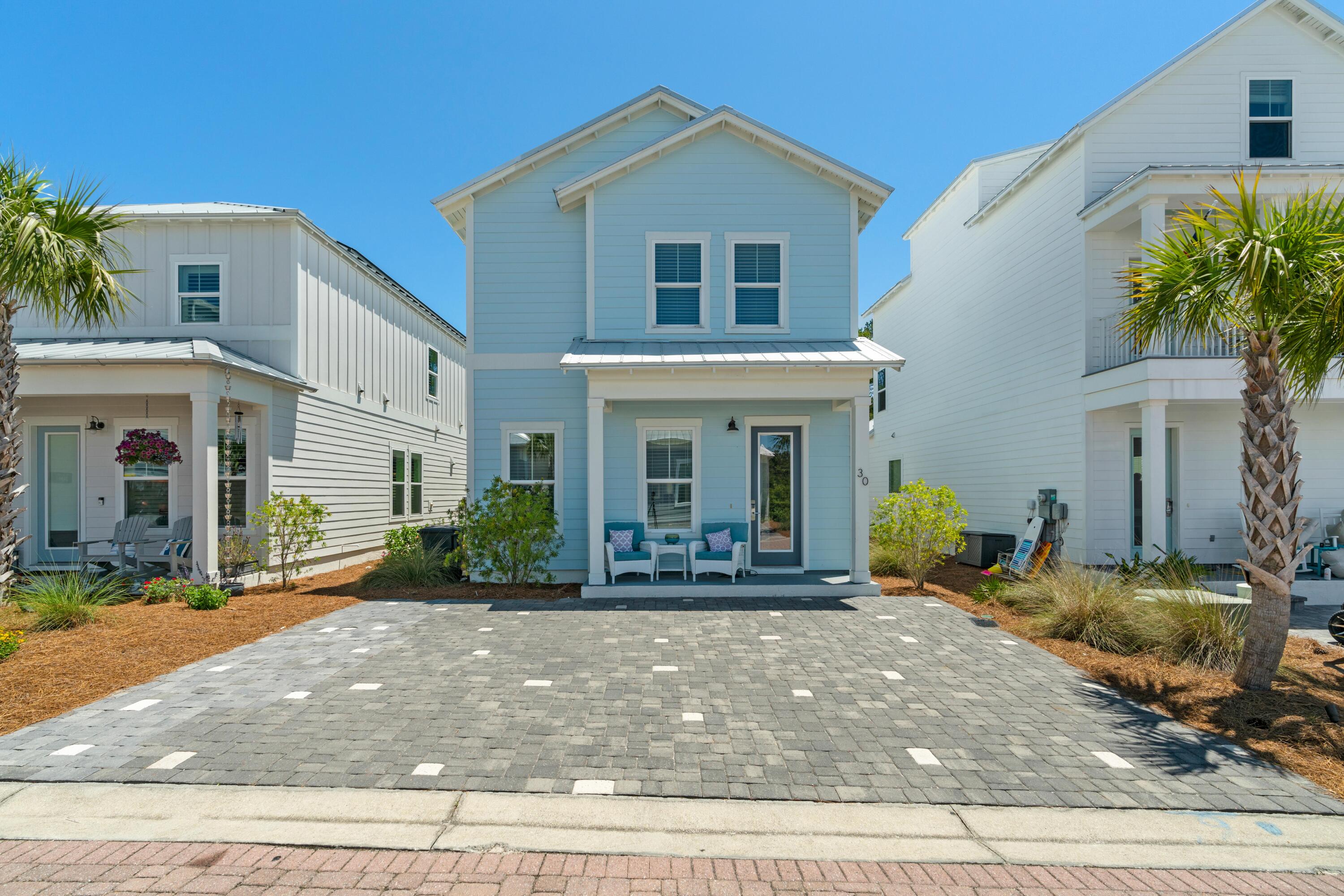 30 Constant Avenue Santa Rosa Beach, FL 32459 - Photo 46 of 51 a front view of a house with a yard