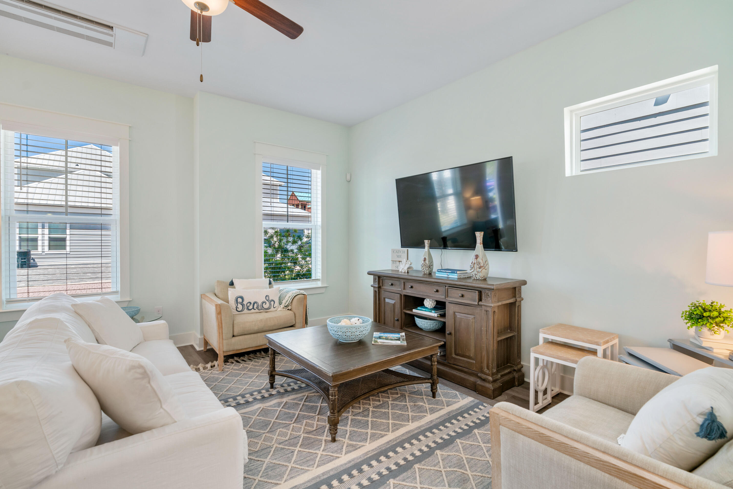 30 Constant Avenue Santa Rosa Beach, FL 32459 - Photo 5 of 51 a living room with furniture and a flat screen tv