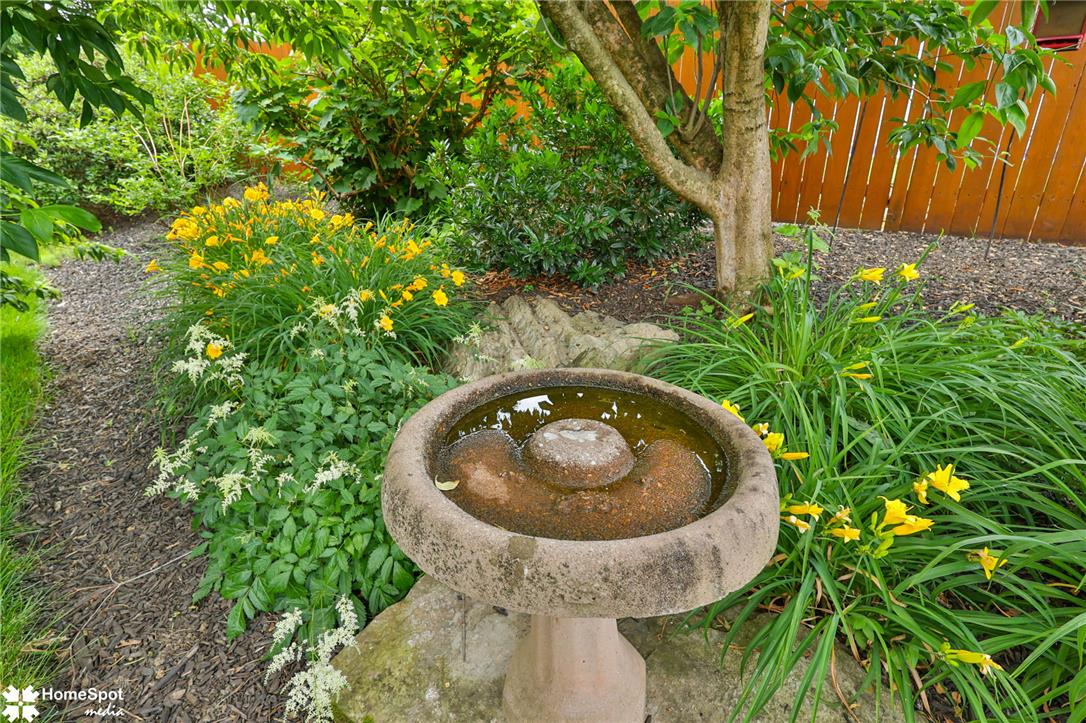 2821 Center Street Bethlehem, PA 18017 - Photo 64 of 68 A tranquil bird bath anchors this private yard, surrounded by lush plantings and a privacy fence.