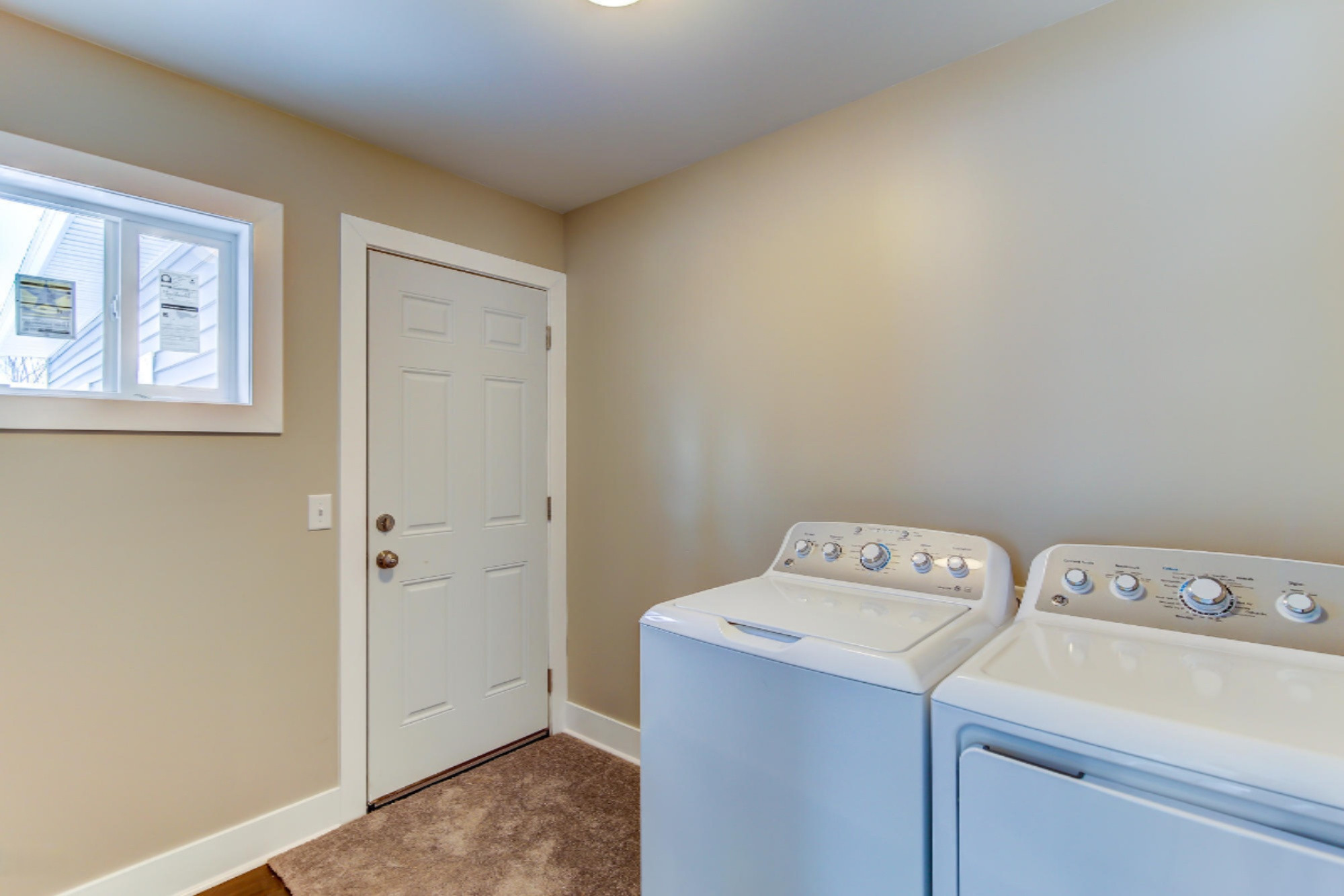 2902 Remy Court Northeast Grand Rapids, MI 49505 - Photo 21 of 41 Main Floor Laundry/Mud Room