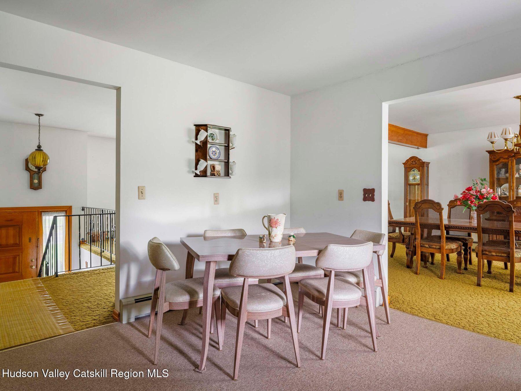 104 New Paltz Road Highland, NY 12528 - Photo 8 of 43 a view of a dining room with furniture