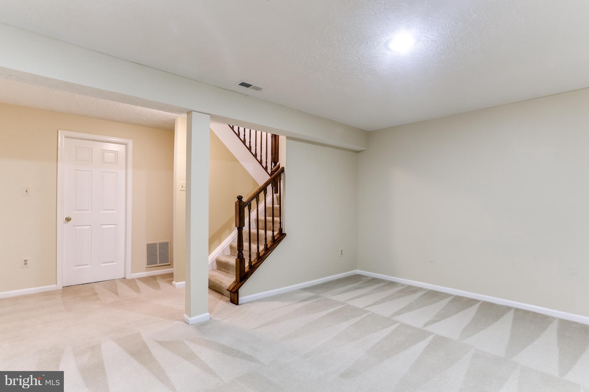 6 Ramsgate Court Halethorpe, MD 21227 - Photo 27 of 29 a view of an entryway with stairs
