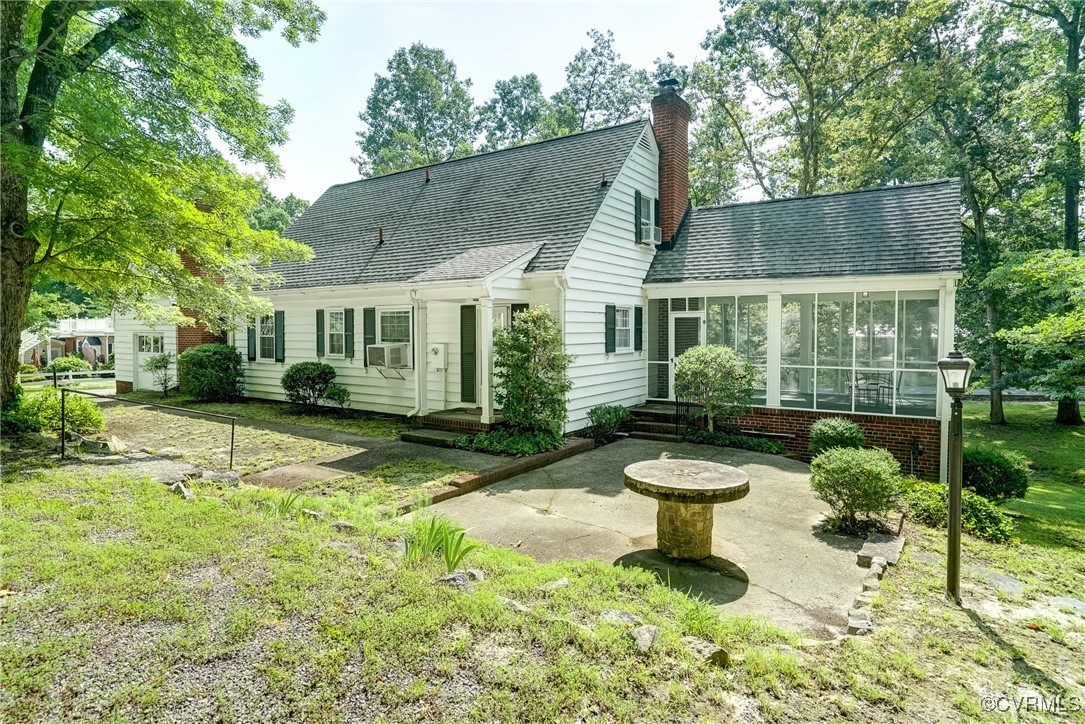 1604 Michael Road Henrico, VA 23229 - Photo 29 of 33 Rear view of home showing patio and hand made tabl