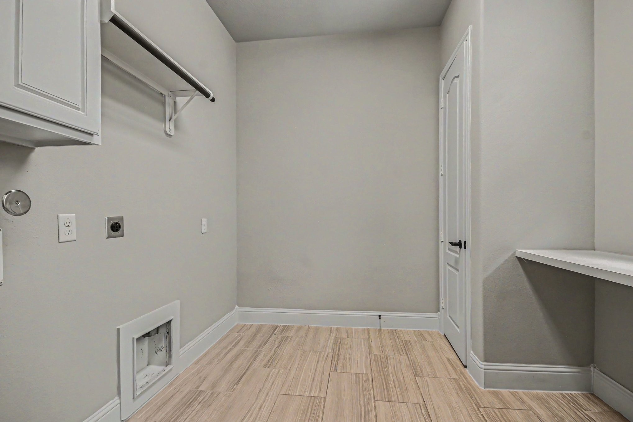 3310 Ralston Edge Lane Houston, TX 77059 - Photo 39 of 50 a view of an empty room with wooden floor and closet