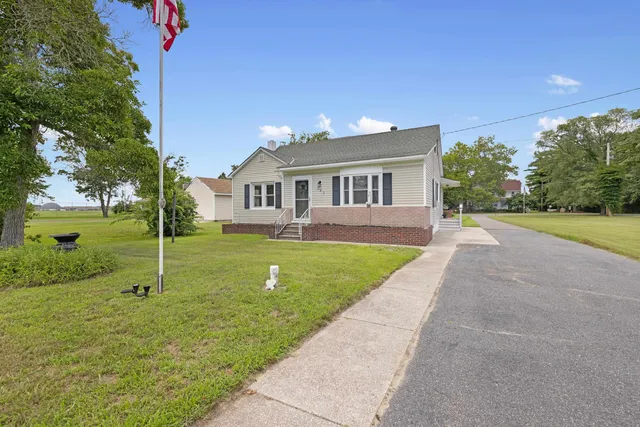 a house view with a garden space