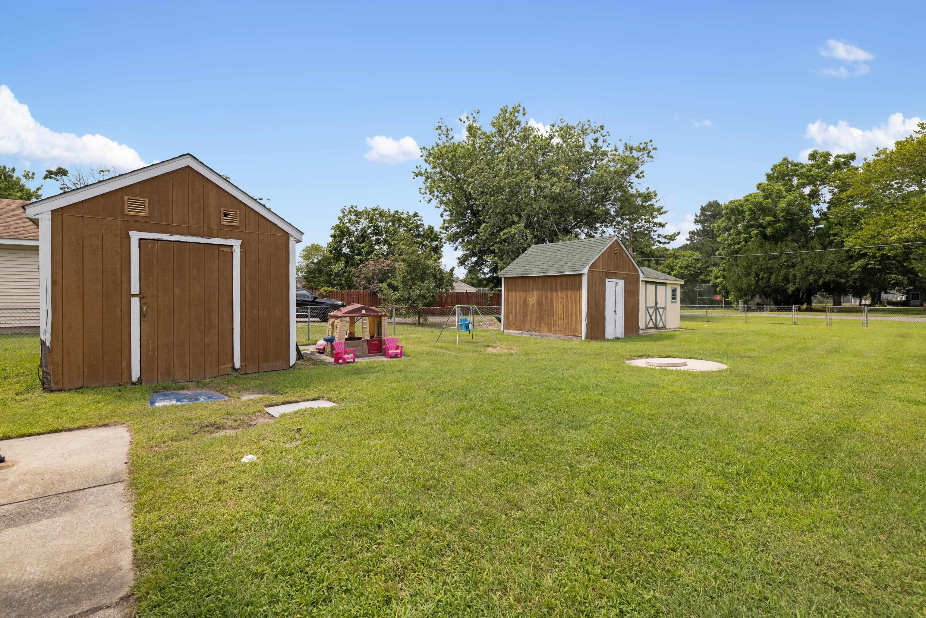 545 Breakwater Road Erma, NJ 08204 - Photo 25 of 27 a view of a house with backyard and garden