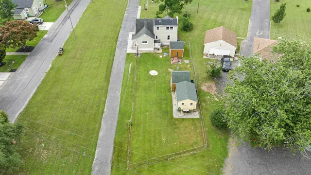 a view of swimming pool with a yard