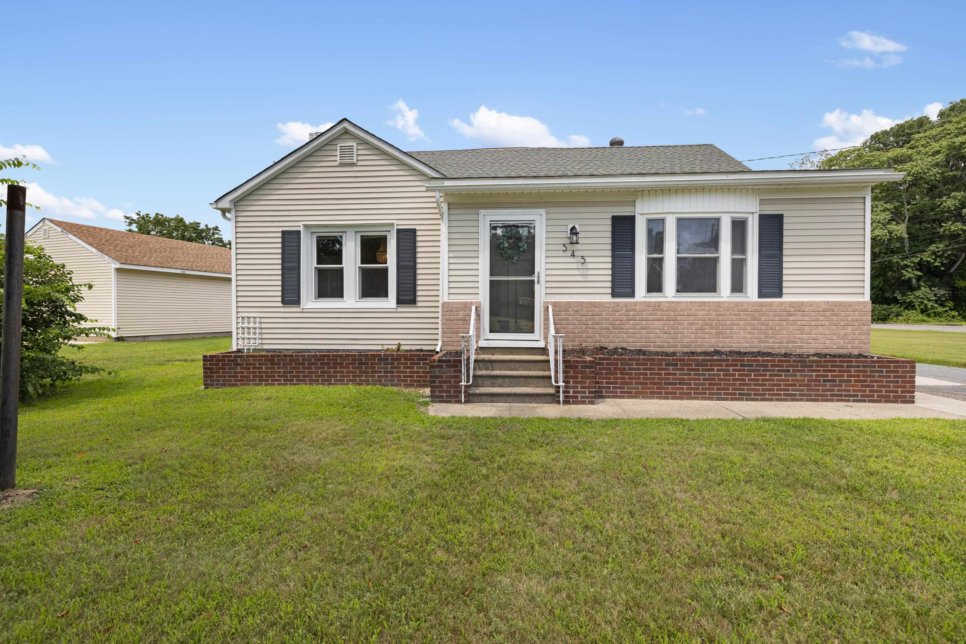 545 Breakwater Road Erma, NJ 08204 - Photo 3 of 27 a front view of a house with a garden