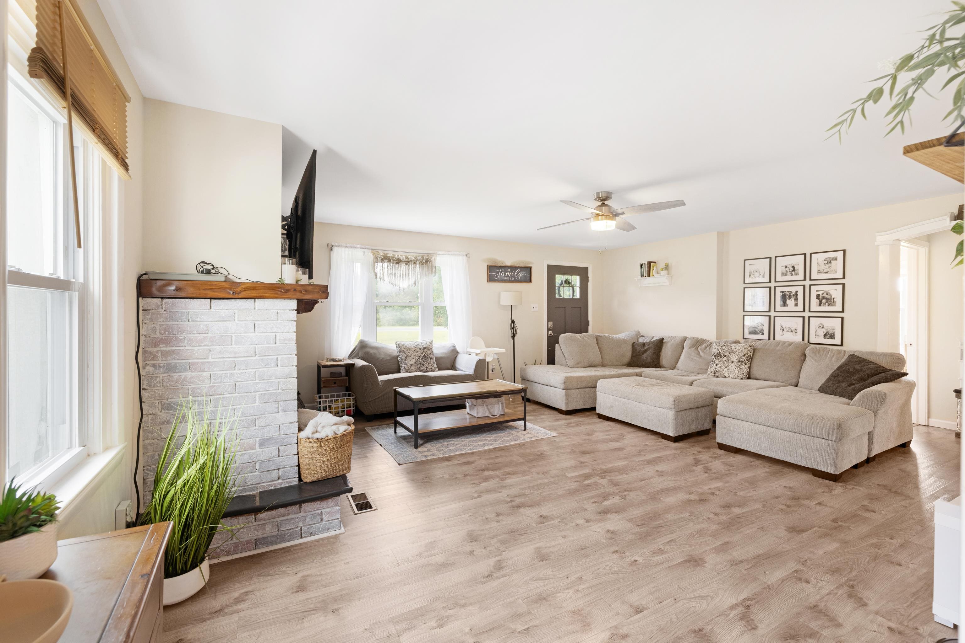 545 Breakwater Road Erma, NJ 08204 - Photo 5 of 27 a living room with furniture and a large window