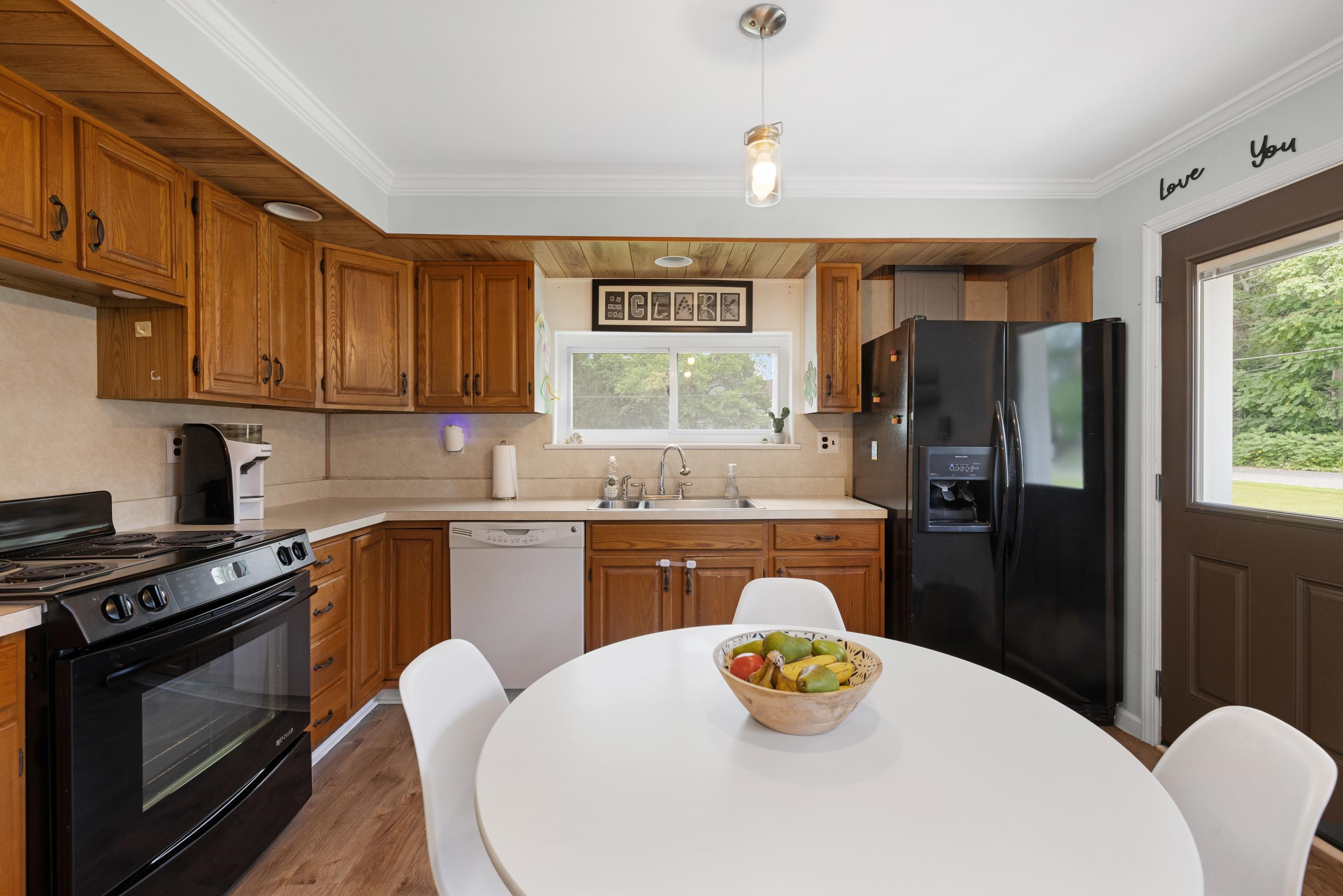 545 Breakwater Road Erma, NJ 08204 - Photo 9 of 27 a kitchen with stainless steel appliances a kitchen island a stove a table and chairs