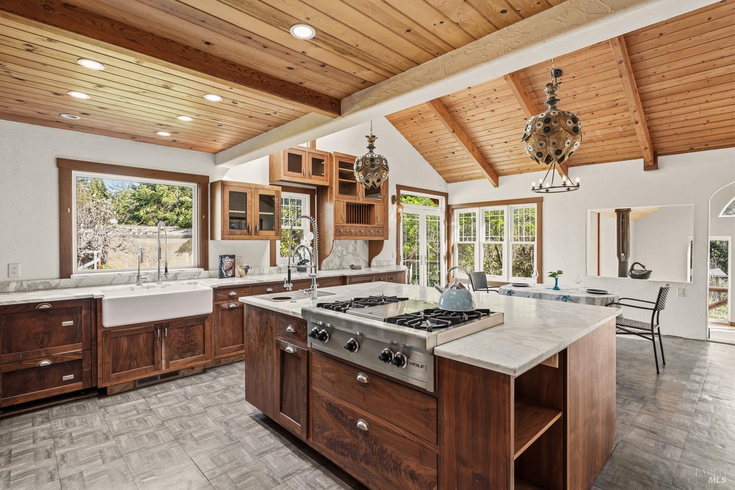 a kitchen with a stove and a sink