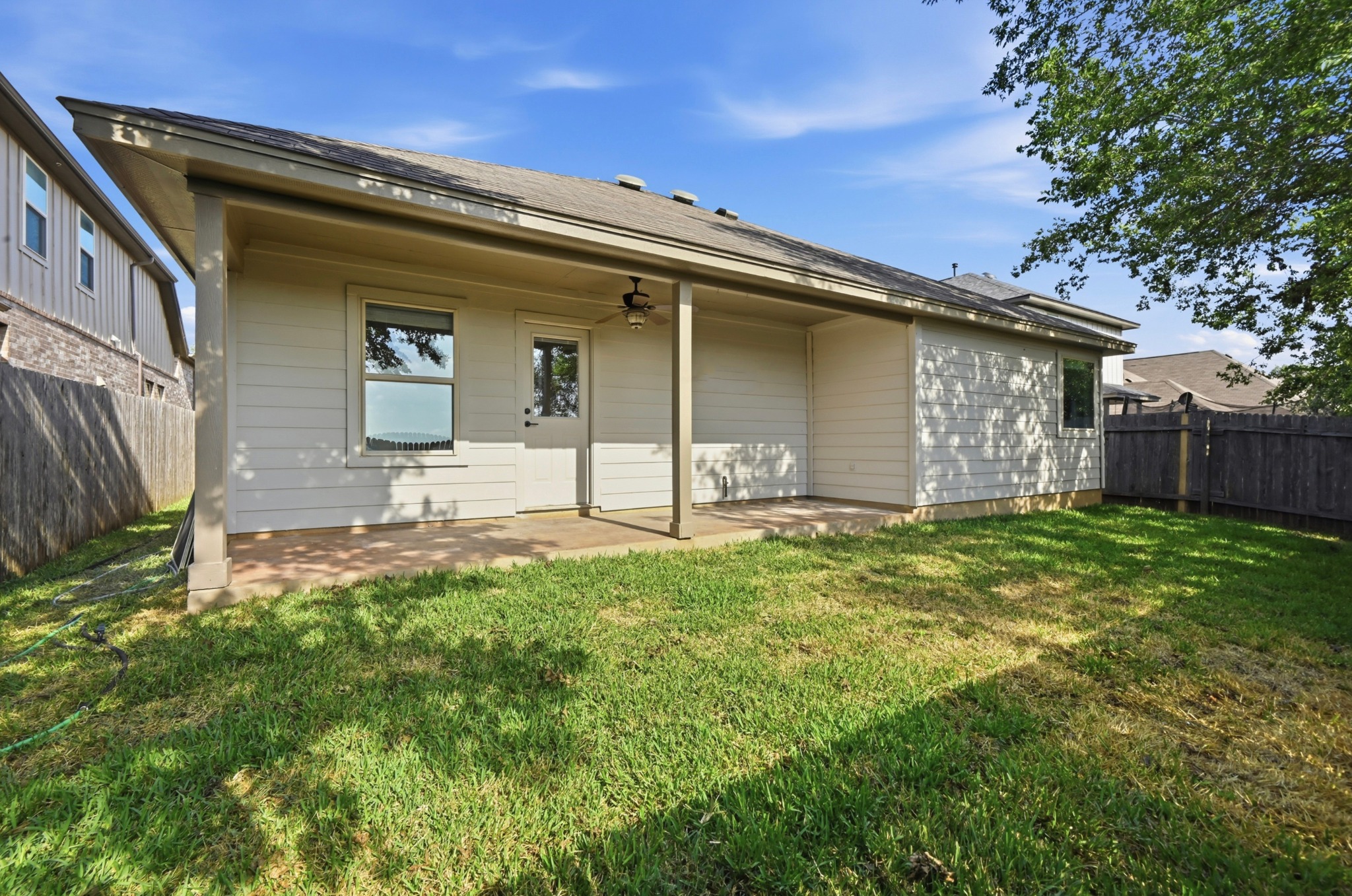 13009 Olivers Way Manchaca, TX 78652 - Photo 31 of 37 front view of a house with a big yard