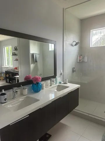 a bathroom with a shower and a toilet