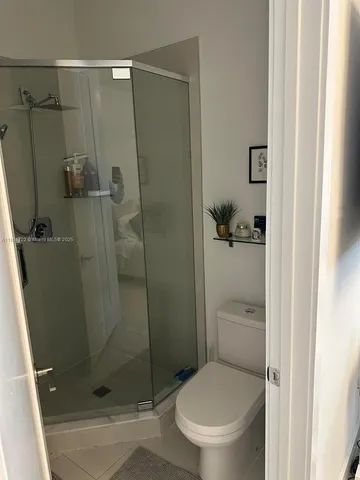 a view of swimming pool with outdoor seating and city view