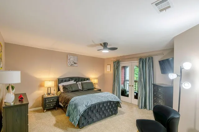 a bathroom with a double vanity sink mirror and