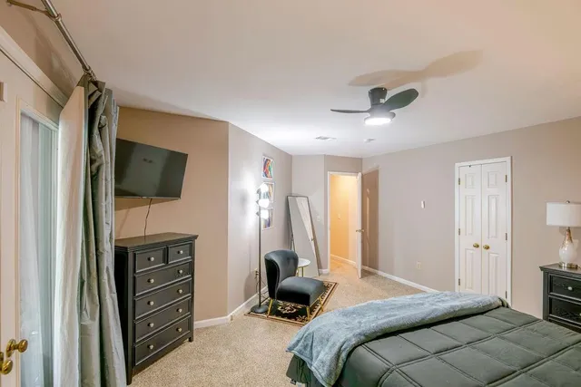 a bathroom with a sink vanity and a mirror