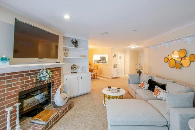 a living room with a couch and a flat screen tv