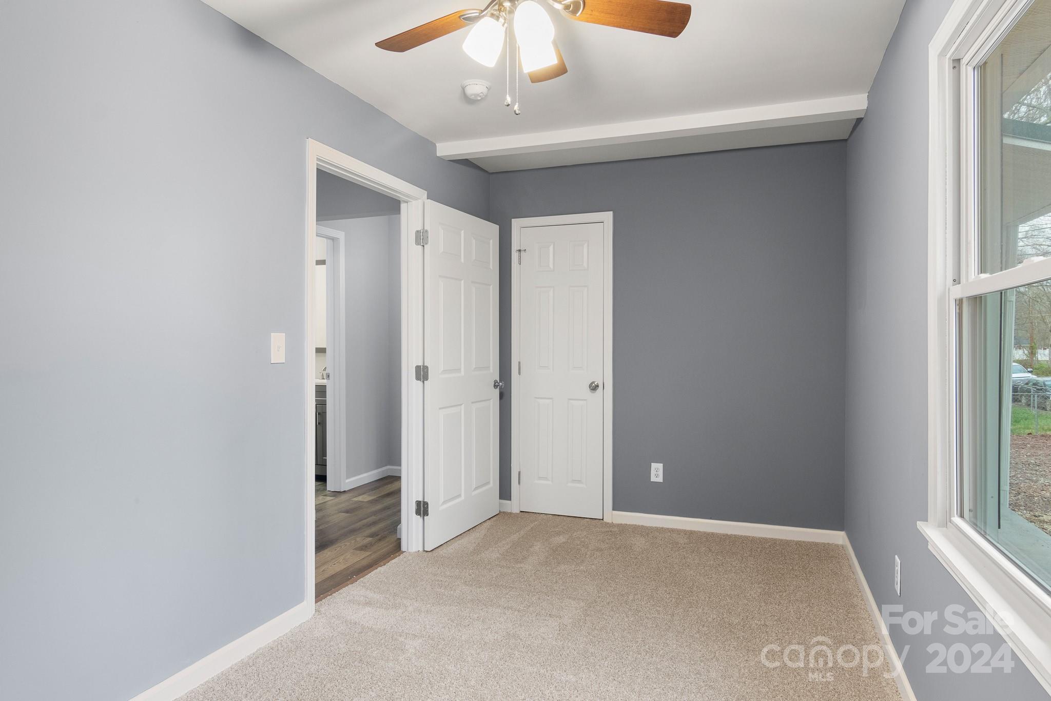233 Charlotte Street York, SC 29745 - Photo 21 of 26 an empty room with windows and closet
