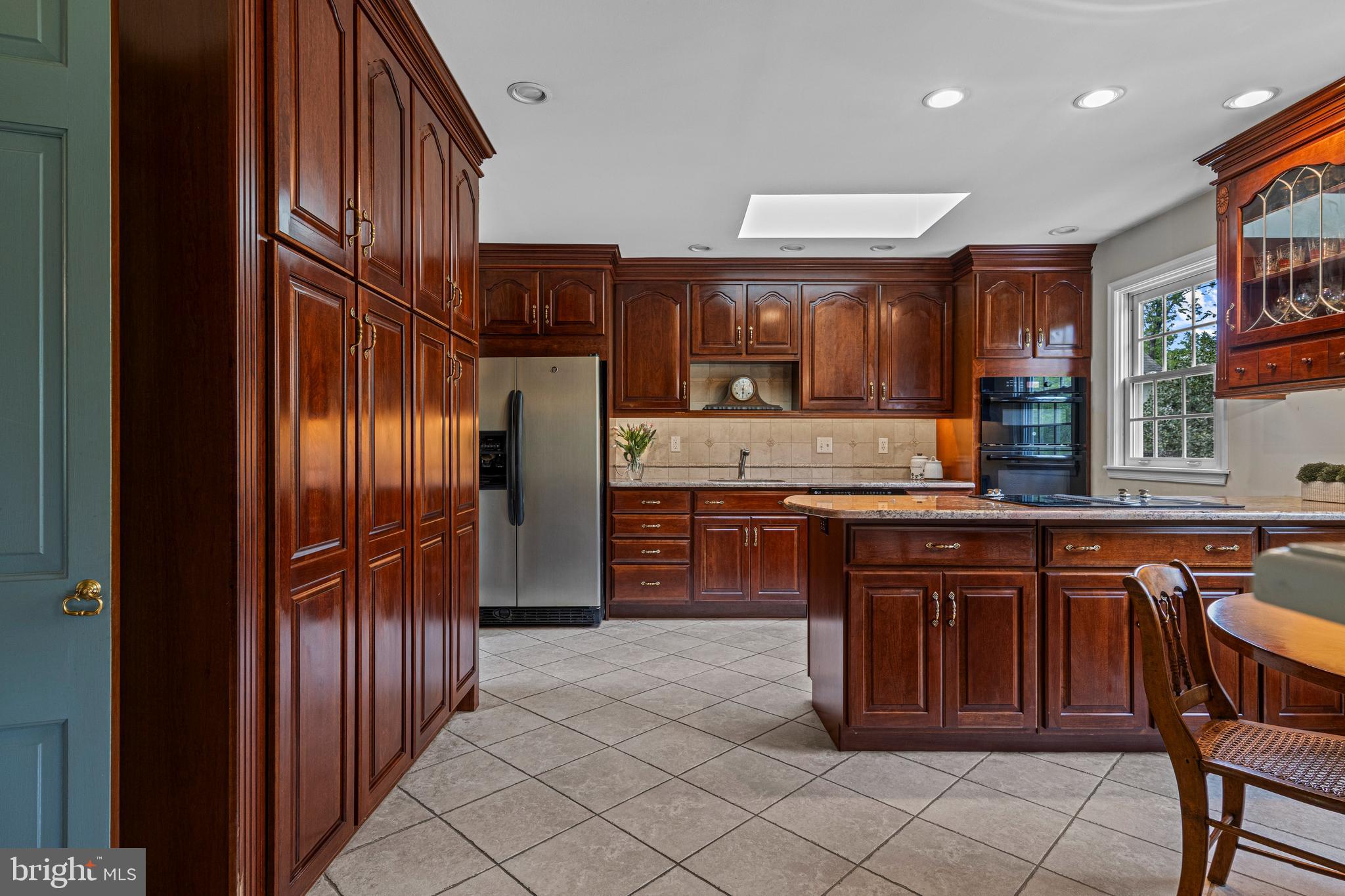 159 Gwynedd Manor Road North Wales, PA 19454 - Photo 10 of 34 Large, bright kitchen with island and storage