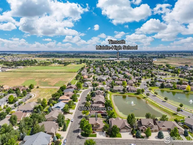 a view of a city with an ocean
