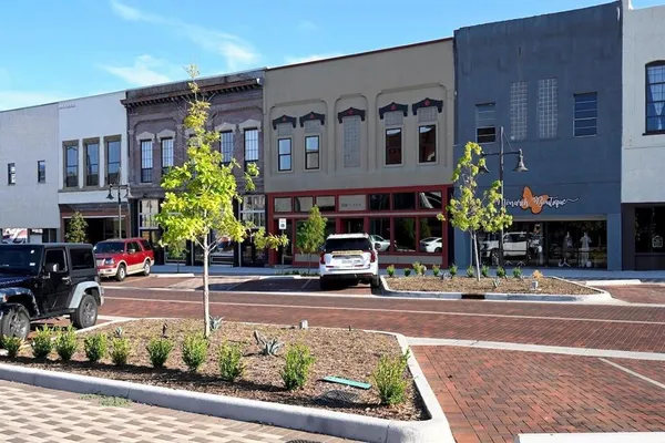 a front view of a building with street