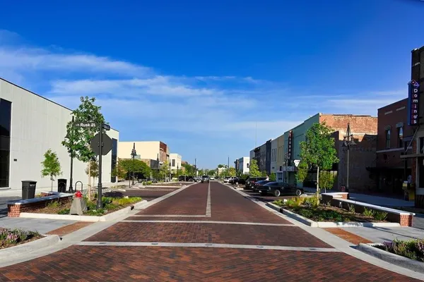 a view of a street with houses